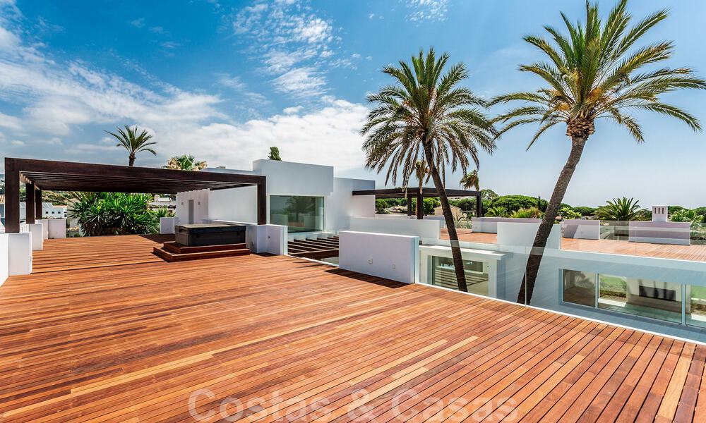 Modern beachside villa for sale in East Marbella with sea views, a stone's throw away from beautiful and cozy beaches 36463