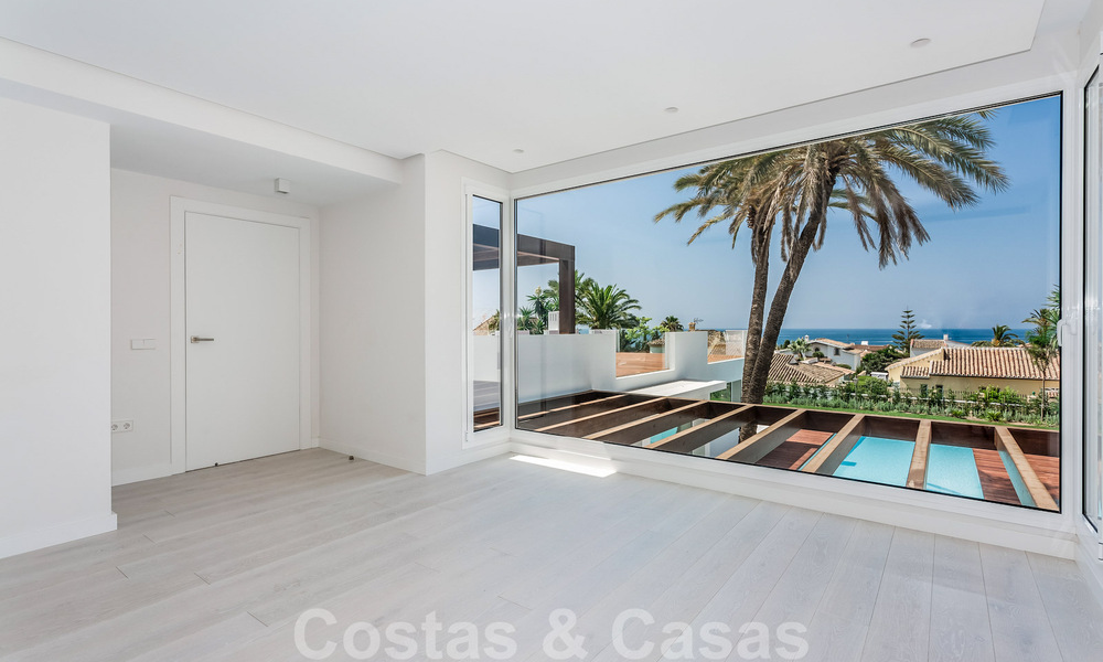 Modern beachside villa for sale in East Marbella with sea views, a stone's throw away from beautiful and cozy beaches 36482