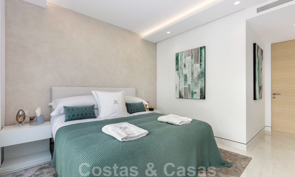 Sleek modern, luxury frontline beach apartment for sale in Emare, on the New Golden Mile, between Marbella and Estepona 36938