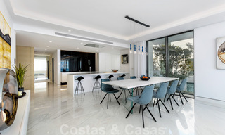 Sleek modern, luxury frontline beach apartment for sale in Emare, on the New Golden Mile, between Marbella and Estepona 36948 