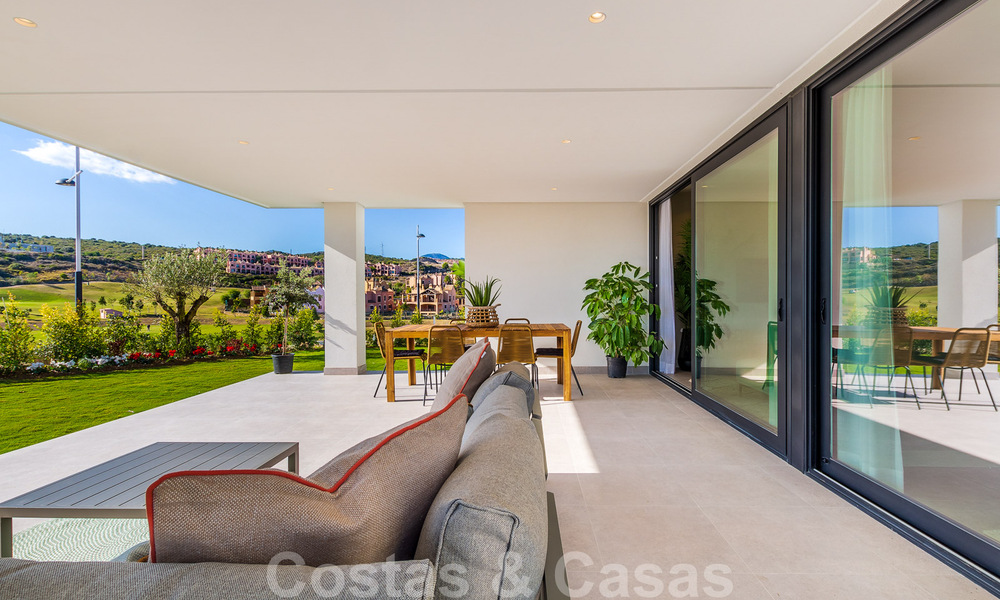 New development with luxury apartments for sale offering panoramic views to the sea and a golf course in Estepona 37421