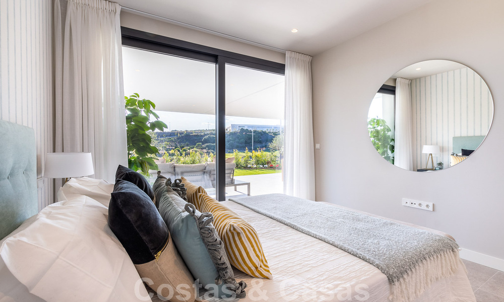New development with luxury apartments for sale offering panoramic views to the sea and a golf course in Estepona 37436