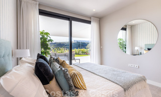 New development with luxury apartments for sale offering panoramic views to the sea and a golf course in Estepona 37436 