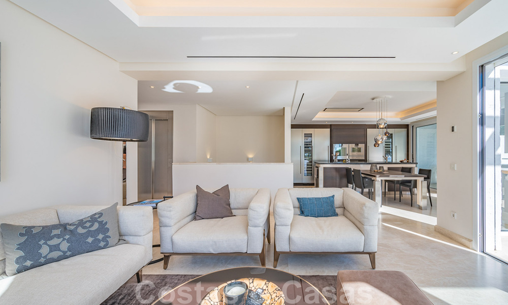 Contemporary refurbished frontline beach luxury penthouse for sale on the Golden Mile in Marbella 37692