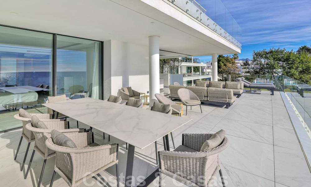 Ready to move in, modern, ultra-luxury apartment for sale, frontline beach, with open sea views, between Marbella and Estepona 38435