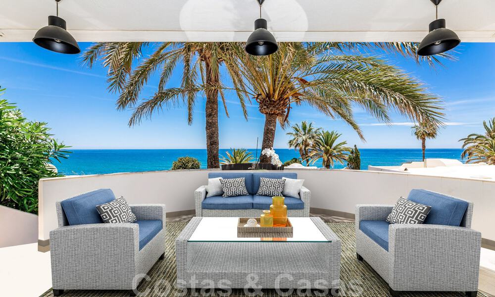 Stylish, second-line beach house for sale with expansive sea views in beachfront gated community on the Golden Mile in Marbella 38594