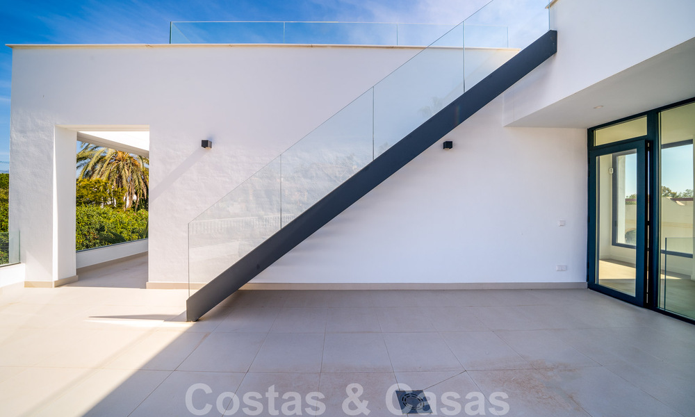 Very affordable, new, ready to move in, modern, beachside villa for sale on the New Golden Mile between Marbella and Estepona, just steps from the beach 38891