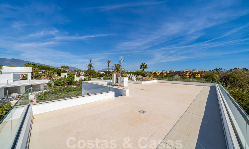 Very affordable, new, ready to move in, modern, beachside villa for sale on the New Golden Mile between Marbella and Estepona, just steps from the beach 38892
