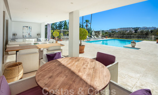 Contemporary, prime location luxury villa for sale in a gated community, frontline golf Las Brisas in Nueva Andalucia, Marbella 39063 