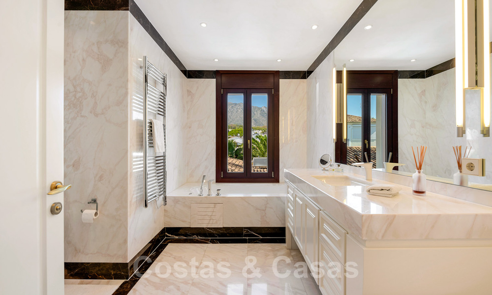 Mediterranean, beachside villa for sale in exclusive residential area on the beach on the Golden Mile of Marbella 39166