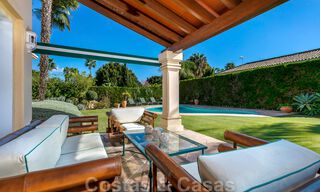 Luxury villa in Mediterranean style for sale within walking distance to the beach, golf course and amenities in the prestigious Guadalmina Baja in Marbella 39576 