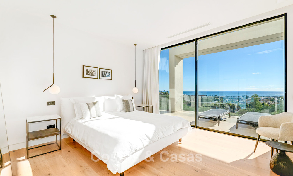 Modern, architectural villa with panoramic sea views for sale in a five star golf resort in Marbella - Benahavis 791724