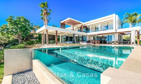 Modern, architectural villa with panoramic sea views for sale in a five star golf resort in Marbella - Benahavis 791725