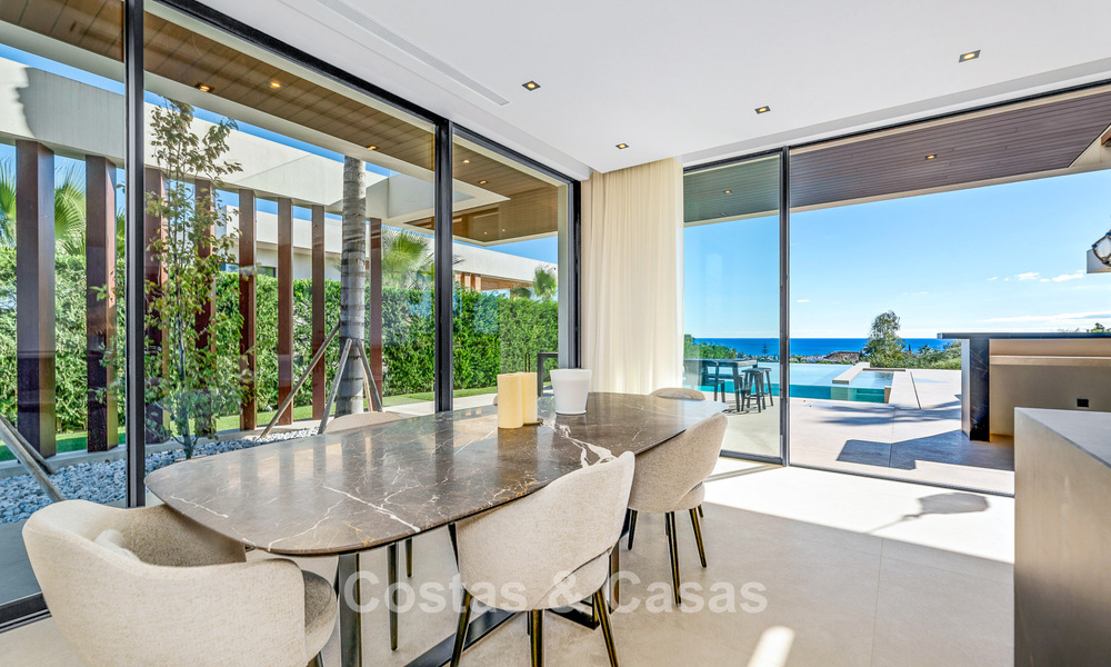 Modern, architectural villa with panoramic sea views for sale in a five star golf resort in Marbella - Benahavis 791727