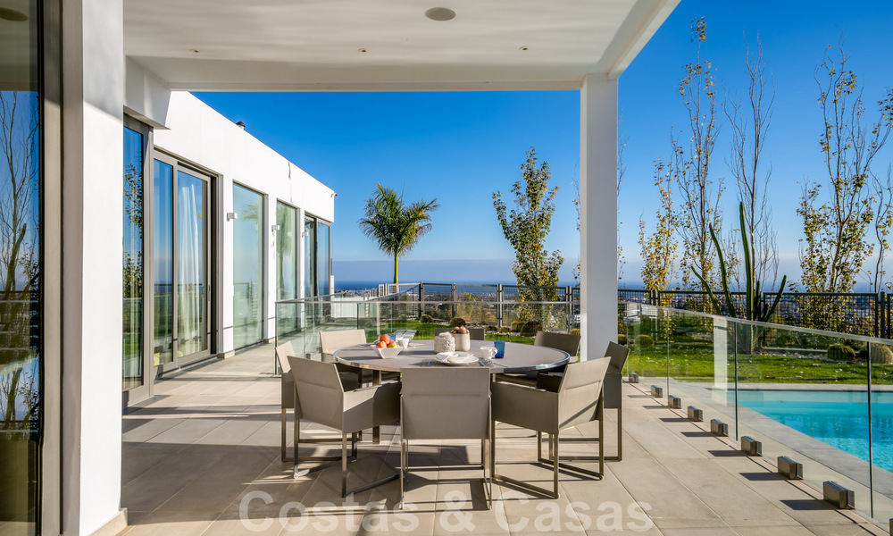 Spacious, architectural villa for sale with spectacular open sea views in a private community in Benahavis - Marbella 39920