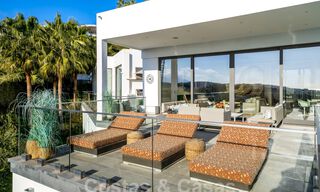 Spacious, architectural villa for sale with spectacular open sea views in a private community in Benahavis - Marbella 39923 