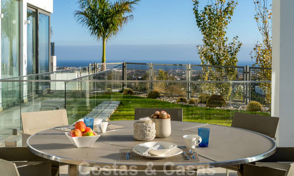 Spacious, architectural villa for sale with spectacular open sea views in a private community in Benahavis - Marbella 39924