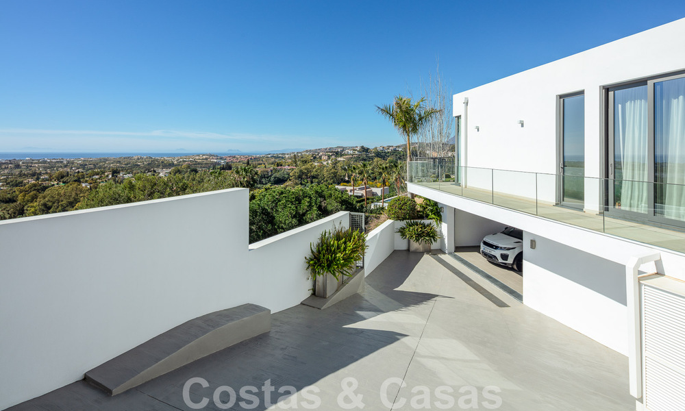 Spacious, architectural villa for sale with spectacular open sea views in a private community in Benahavis - Marbella 52156