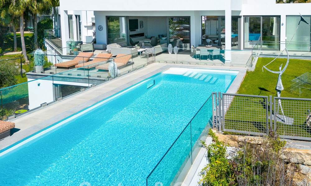 Spacious, architectural villa for sale with spectacular open sea views in a private community in Benahavis - Marbella 52162