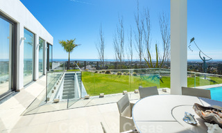 Spacious, architectural villa for sale with spectacular open sea views in a private community in Benahavis - Marbella 52167 