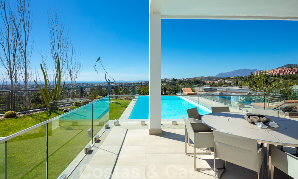 Spacious, architectural villa for sale with spectacular open sea views in a private community in Benahavis - Marbella 52168