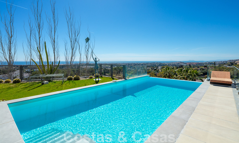 Spacious, architectural villa for sale with spectacular open sea views in a private community in Benahavis - Marbella 52169