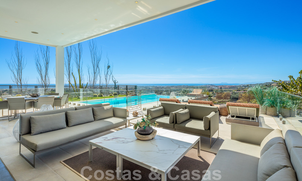 Spacious, architectural villa for sale with spectacular open sea views in a private community in Benahavis - Marbella 52171