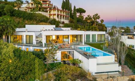 Spacious, architectural villa for sale with spectacular open sea views in a private community in Benahavis - Marbella 52175