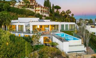 Spacious, architectural villa for sale with spectacular open sea views in a private community in Benahavis - Marbella 52175 