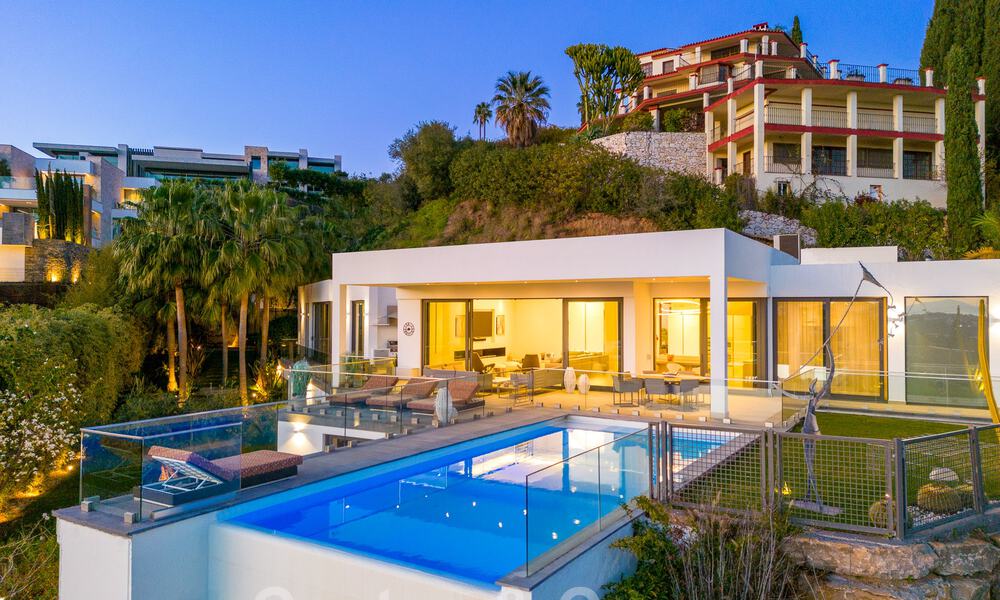 Spacious, architectural villa for sale with spectacular open sea views in a private community in Benahavis - Marbella 52176