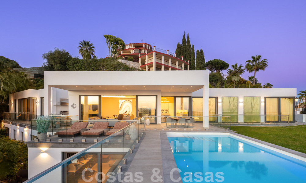 Spacious, architectural villa for sale with spectacular open sea views in a private community in Benahavis - Marbella 52177