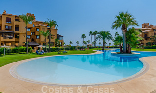 Spacious luxury apartment for sale with sea views, in a frontline beach complex on the New Golden Mile between Marbella and Estepona 40022 