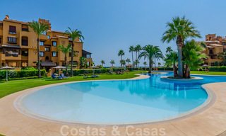 Spacious luxury apartment for sale with sea views, in a frontline beach complex on the New Golden Mile between Marbella and Estepona 40022 