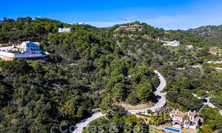 Contemporary, modern villa for sale, located in natural surroundings, with breath-taking views of the valley and the sea, in a gated resort in Benahavis - Marbella 40505 
