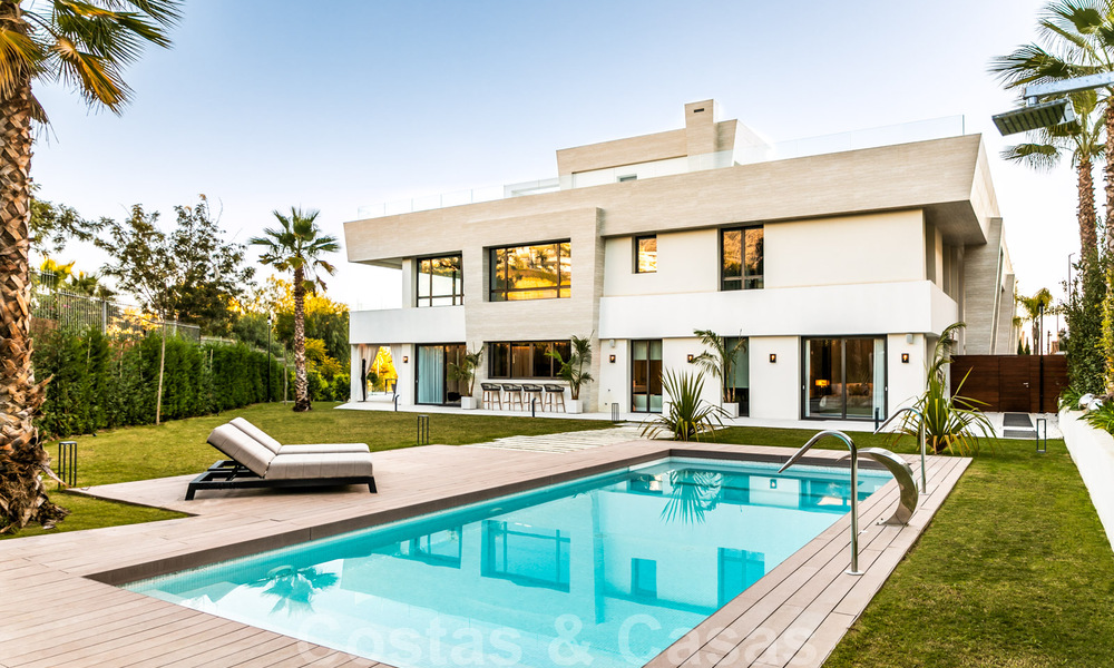Modern duplex apartment for sale with private garden and pool within walking distance to amenities and the beach, in a gated community on the Golden Mile of Marbella 40570