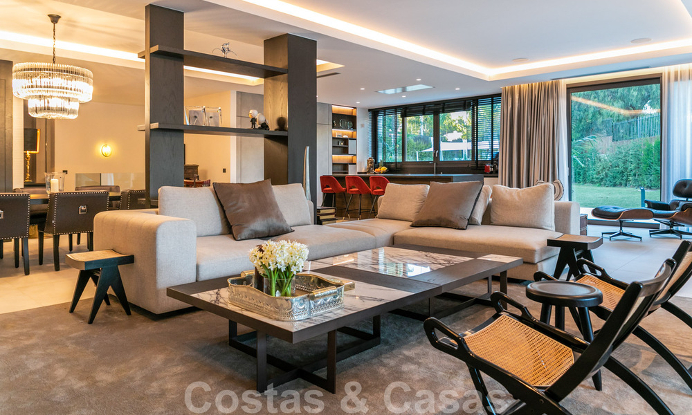 Modern duplex apartment for sale with private garden and pool within walking distance to amenities and the beach, in a gated community on the Golden Mile of Marbella 40572
