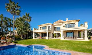 Charming, Spanish, luxury villa for sale, frontline golf with views over the golf course and the sea in Marbella - Benahavis 40870 