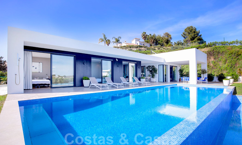 Ready to move in, modern luxury villa for sale with panoramic mountain and sea views in a gated resort in Marbella - Benahavis 41035