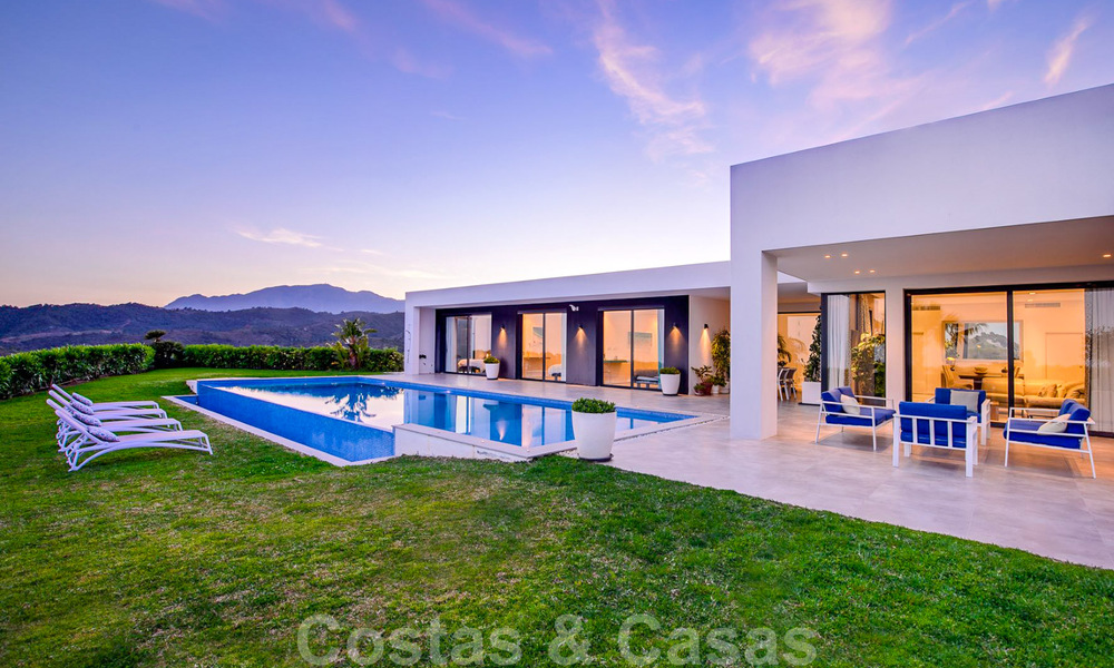 Ready to move in, modern luxury villa for sale with panoramic mountain and sea views in a gated resort in Marbella - Benahavis 41062
