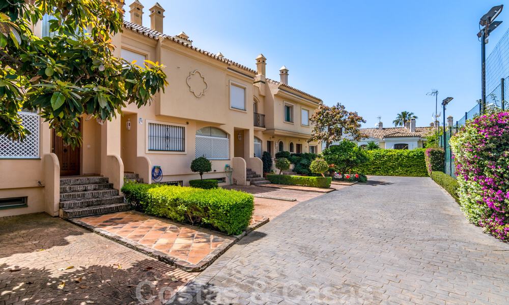 Luxury townhouse for sale, frontline beach, in a gated community, within walking distance to Estepona center 40826