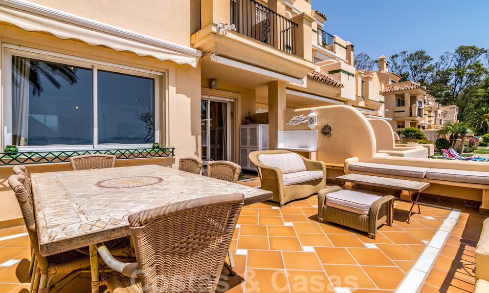 Luxury townhouse for sale, frontline beach, in a gated community, within walking distance to Estepona center 40840