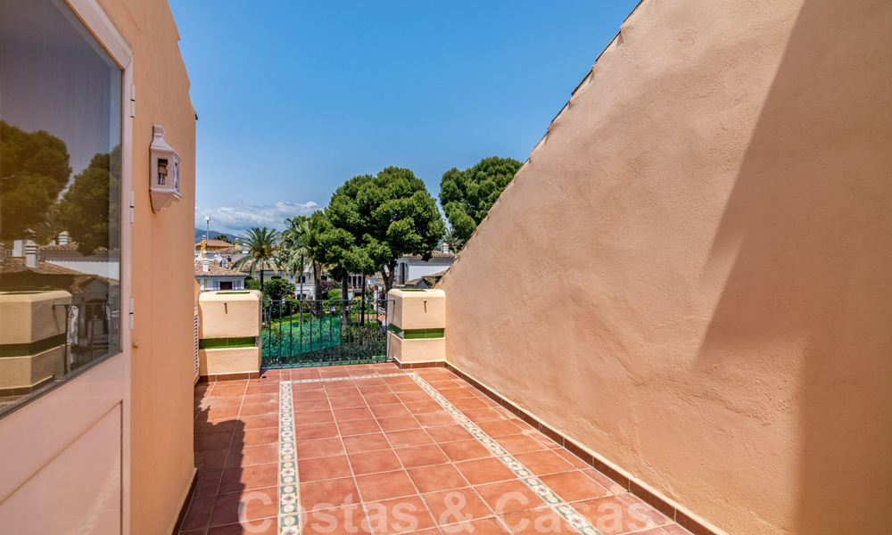 Luxury townhouse for sale, frontline beach, in a gated community, within walking distance to Estepona center 40864