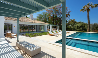 Contemporary, Mediterranean, luxury villa for sale, frontline golf in a gated urbanization in Nueva Andalucia, Marbella 40908 