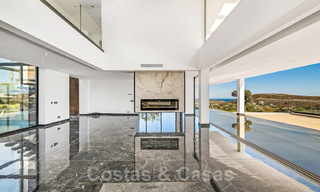 Designer villa for sale with panoramic sea views in a prestigious golf resort in Benahavis - Marbella 40957 
