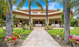 Traditional style luxury villa for sale with garden views, beachside in Guadalmina Baja in Marbella 41819 