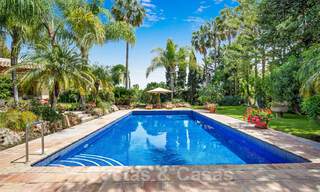 Traditional style luxury villa for sale with garden views, beachside in Guadalmina Baja in Marbella 41820 