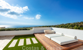 Contemporary, modern luxury villa for sale in resort style with panoramic sea views in Cascada de Camojan in Marbella 42096 