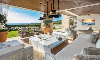 Contemporary, modern luxury villa for sale in resort style with panoramic sea views in Cascada de Camojan in Marbella 42103 