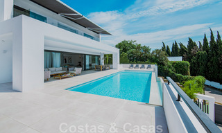 Newly built designer villa for sale in a privileged location in the hills of La Quinta in Benahavis - Marbella 42557 