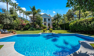 Romantic family villa in classical style for sale, in one of the most exclusive and gated residential areas on the Golden Mile of Marbella 43012 